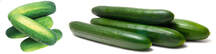 a pile of green and yellow pickles next to four bright green cucumbers