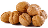a pile of golden brown walnuts